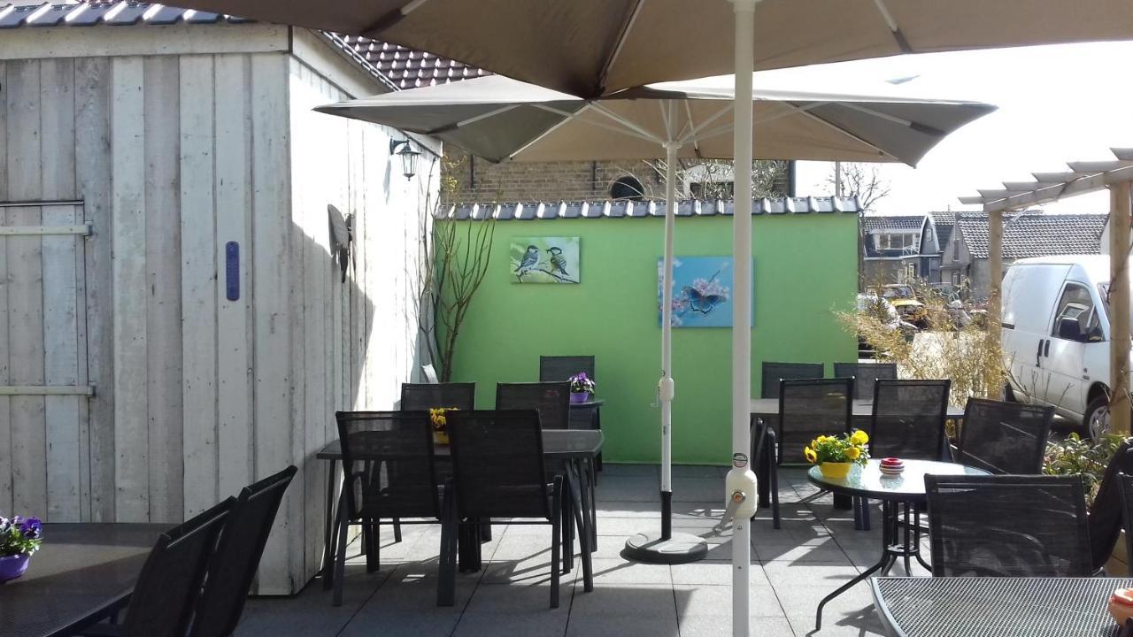 Eetcafe/Pension Nooitgedacht Strijen Extérieur photo