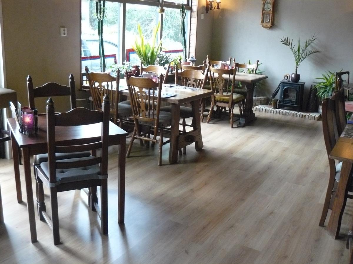 Eetcafe/Pension Nooitgedacht Strijen Extérieur photo